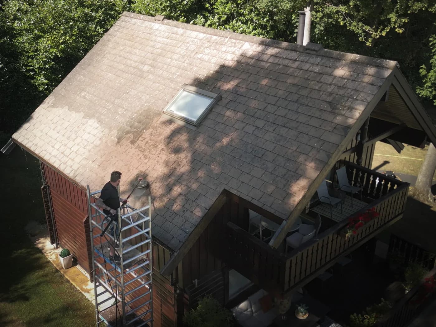 The completed slate roof cleaning project