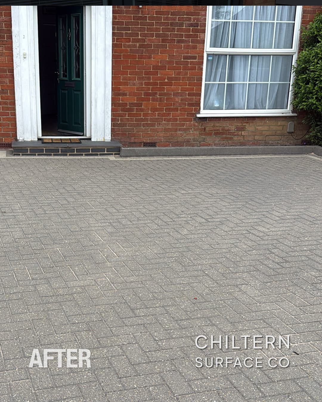 Exterior surface restored after years of embedded dirt and organic growth were professionally removed