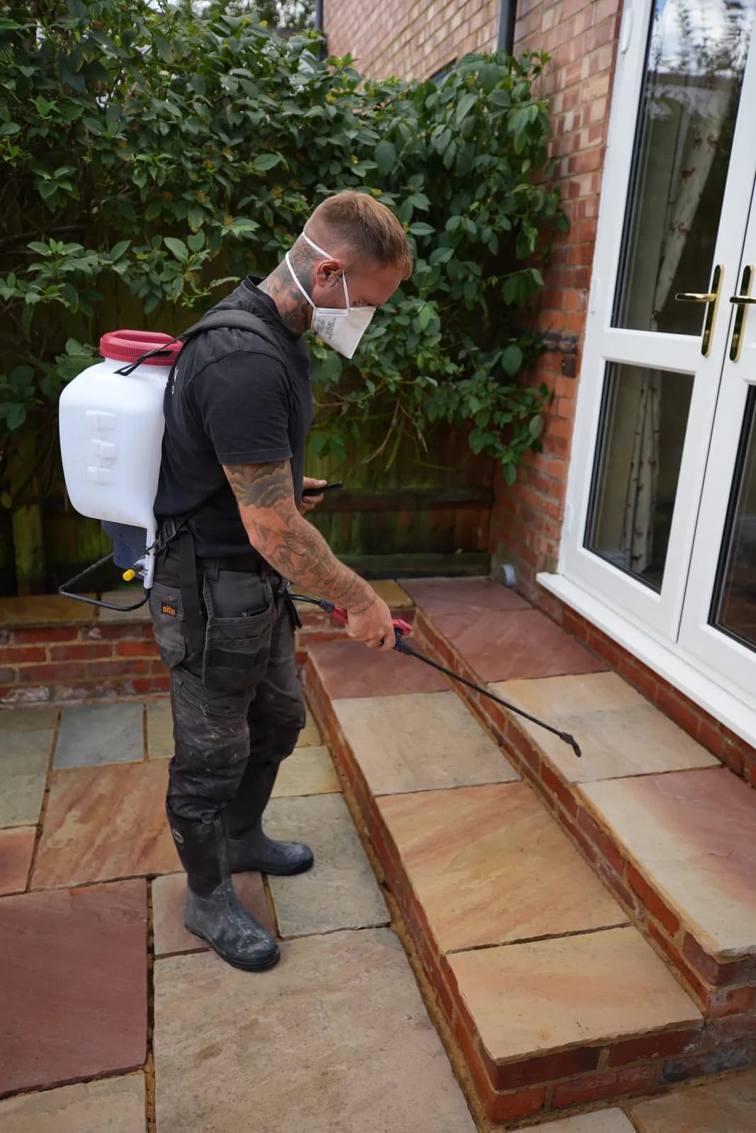 Chiltern Surface Co operative applying a specialist treatment to a natural stone surface