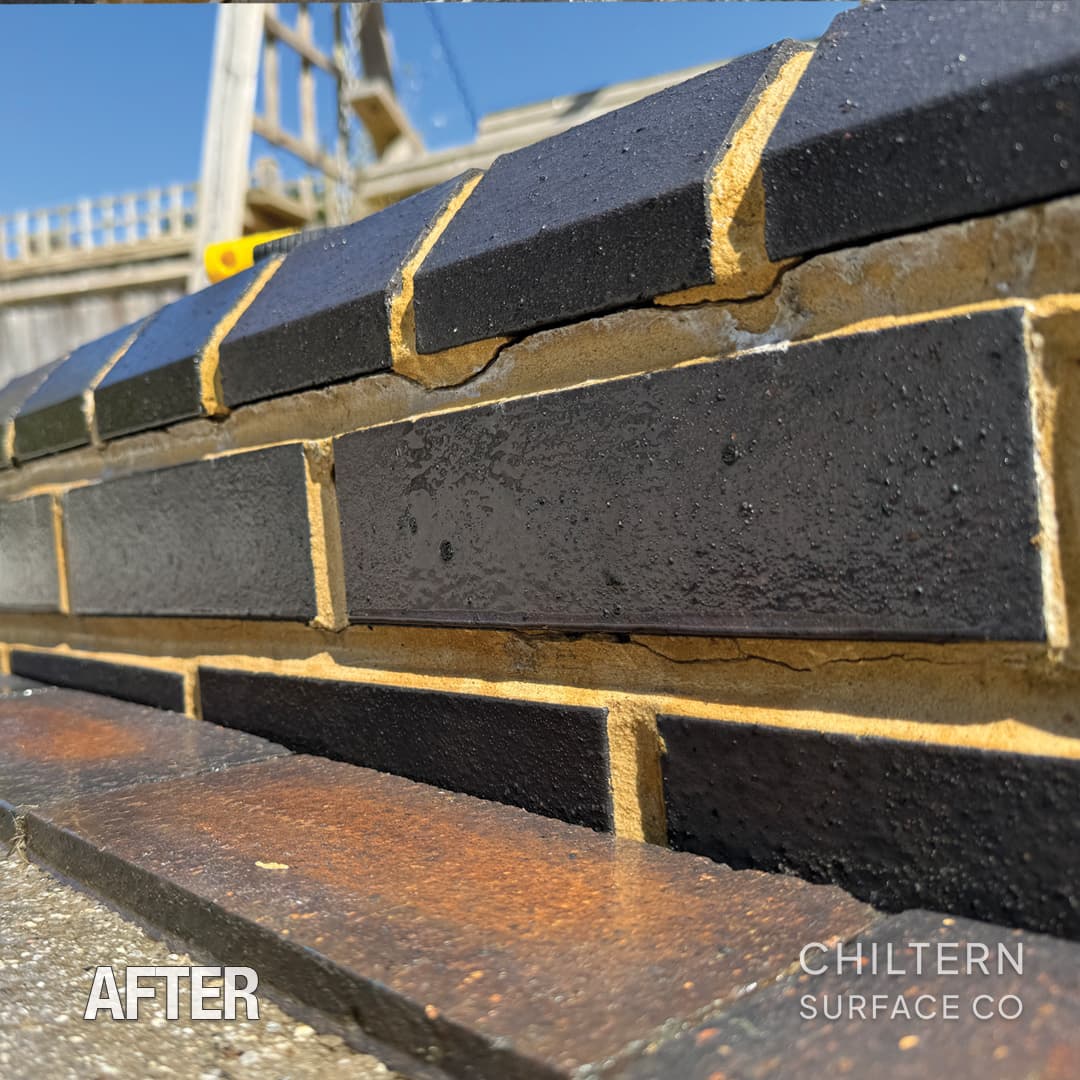 Brick wall after removal of staining and organic growth