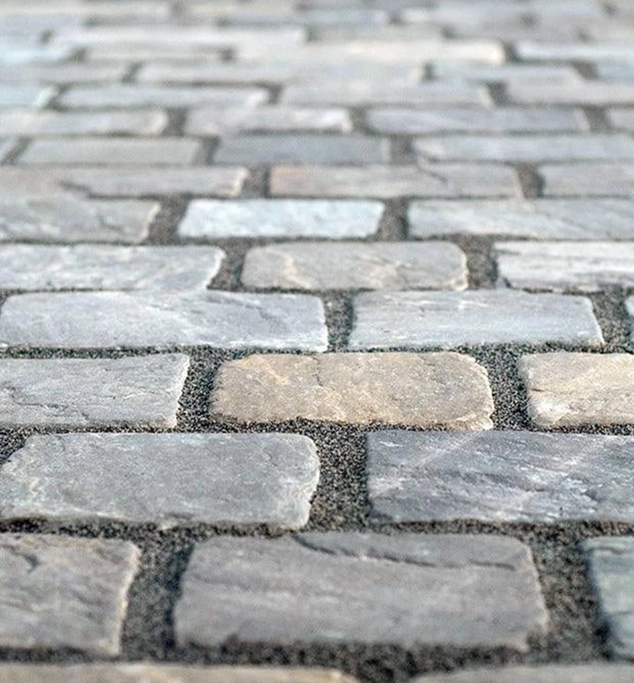 Cobbles and granite setts driveway after professional cleaning