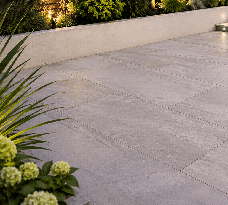 Dark porcelain patio paving after specialist cleaning