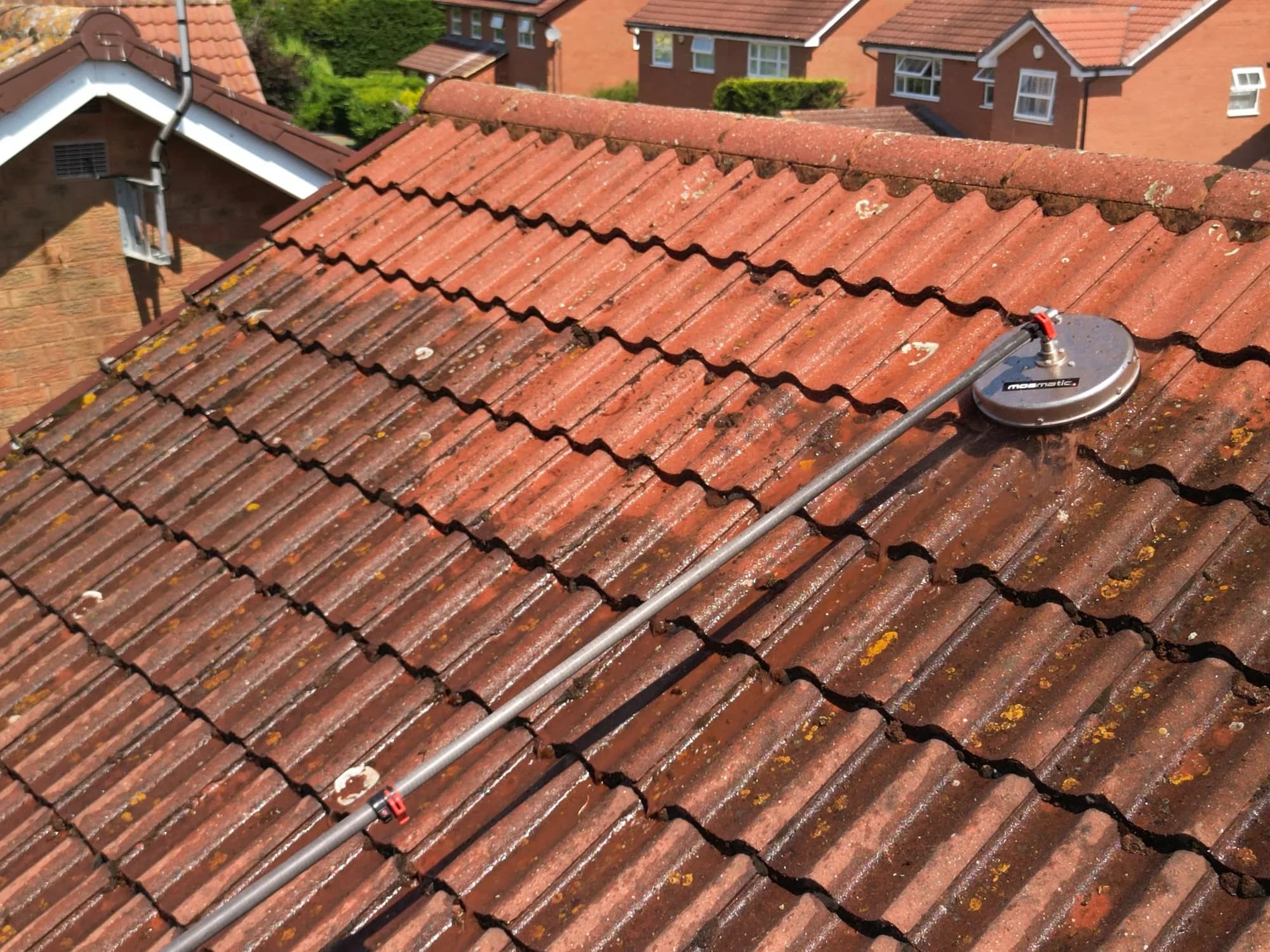 How to Clean a Roof from the Ground