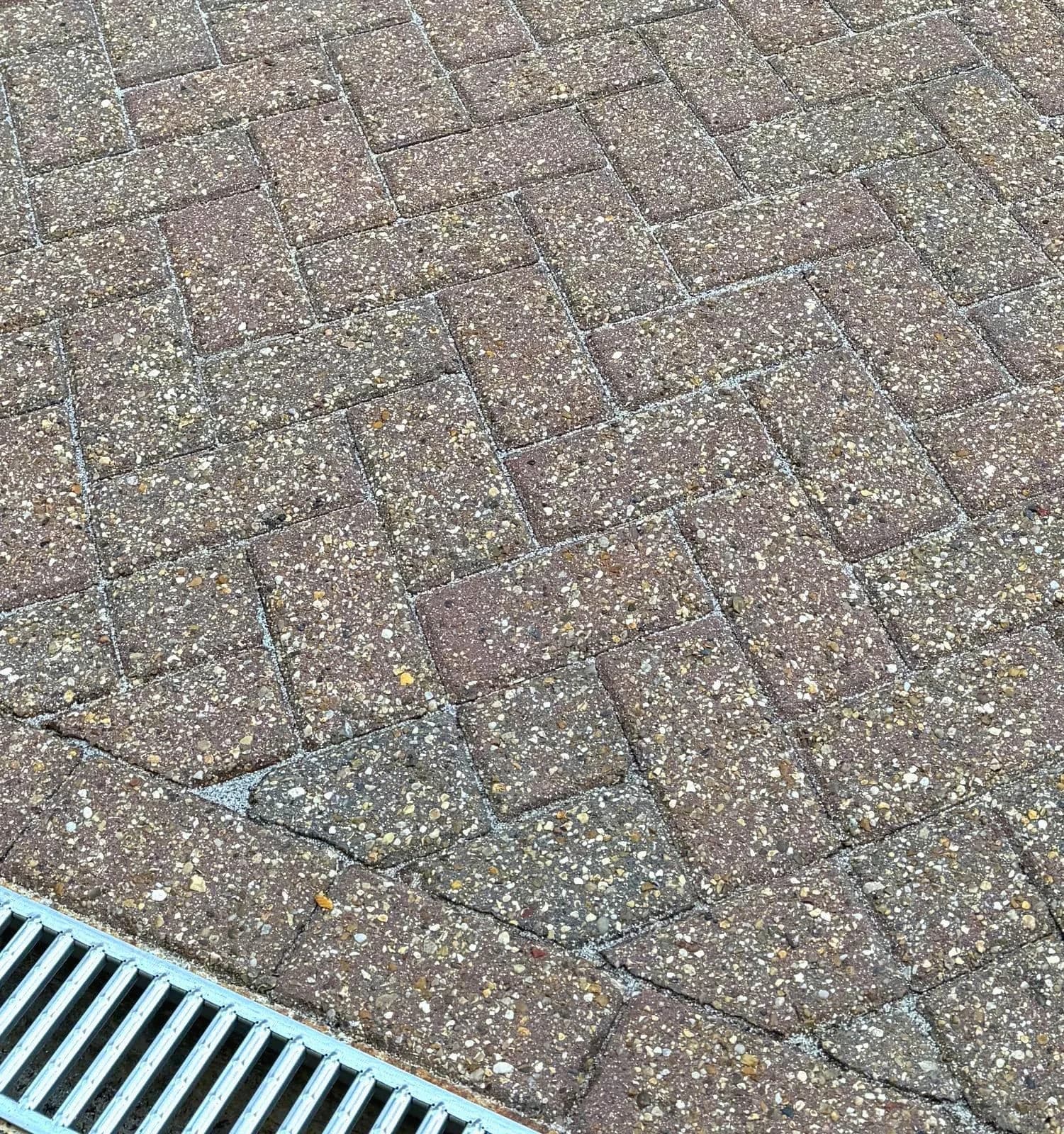 Close-up of the cleaned block paving with new silver-grey polymeric sand joints