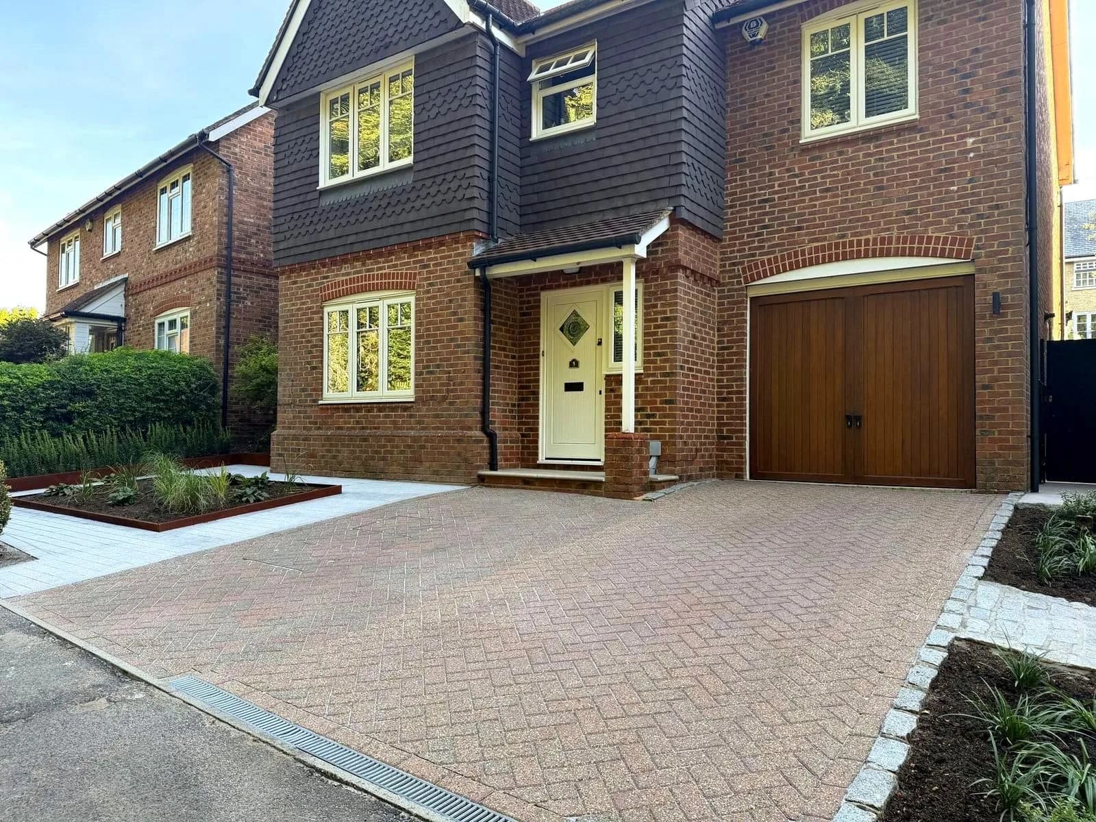 The finished block paved driveway in Hazlemere with the newly designed front garden, photographed from the road