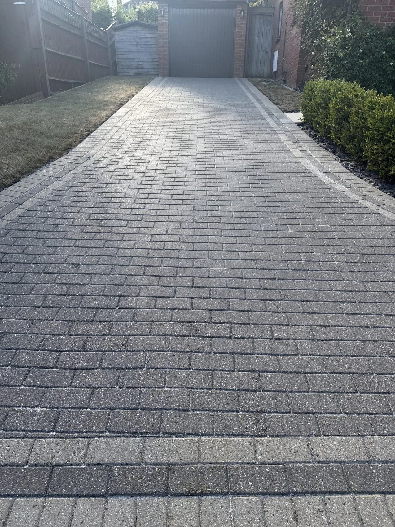 Block paved driveway in High Wycombe after deep cleaning and polymeric re-sanding