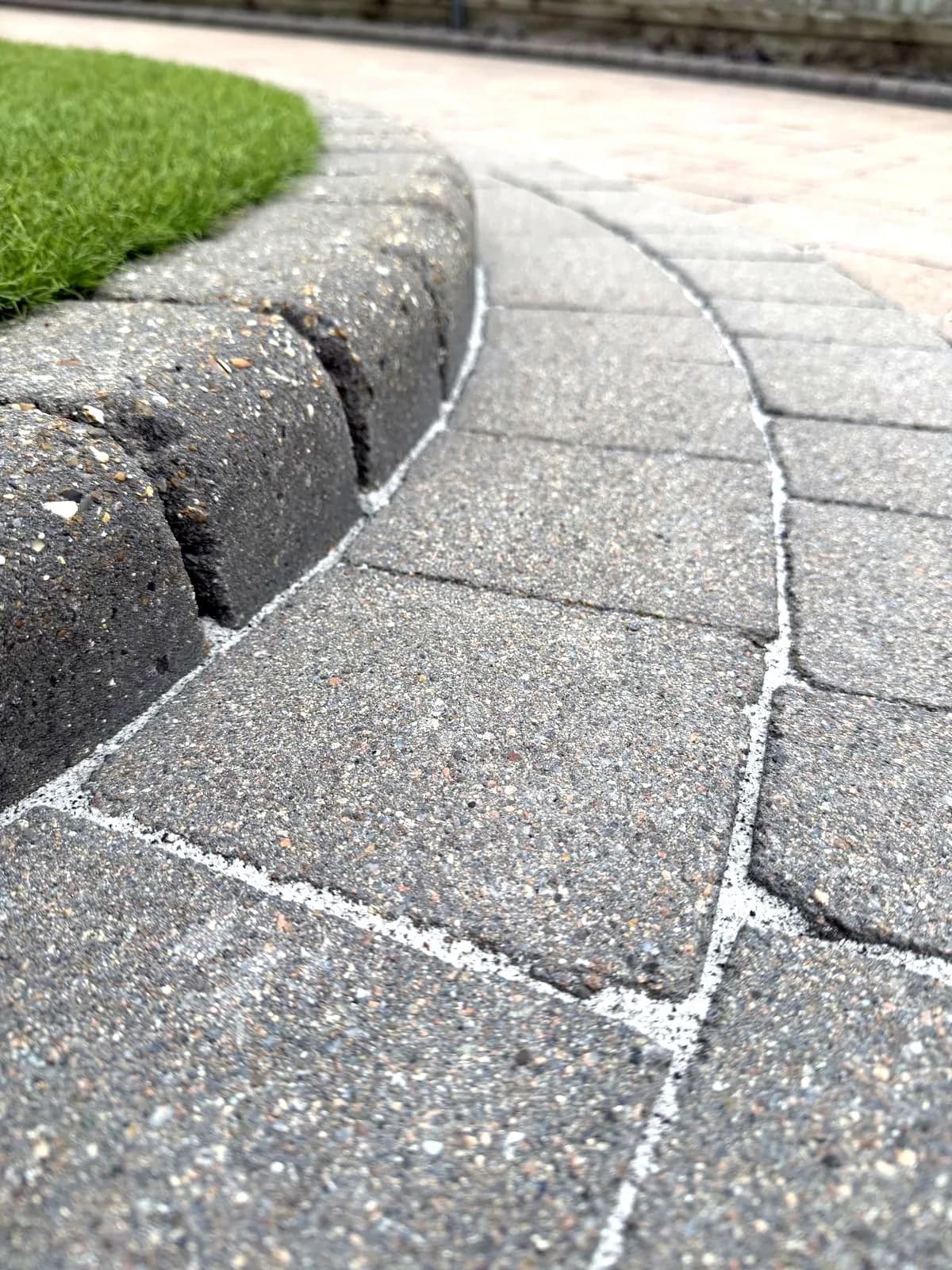 Close-up of the finished block paving and kerb in High Wycombe, with crisp new polymeric sand joints
