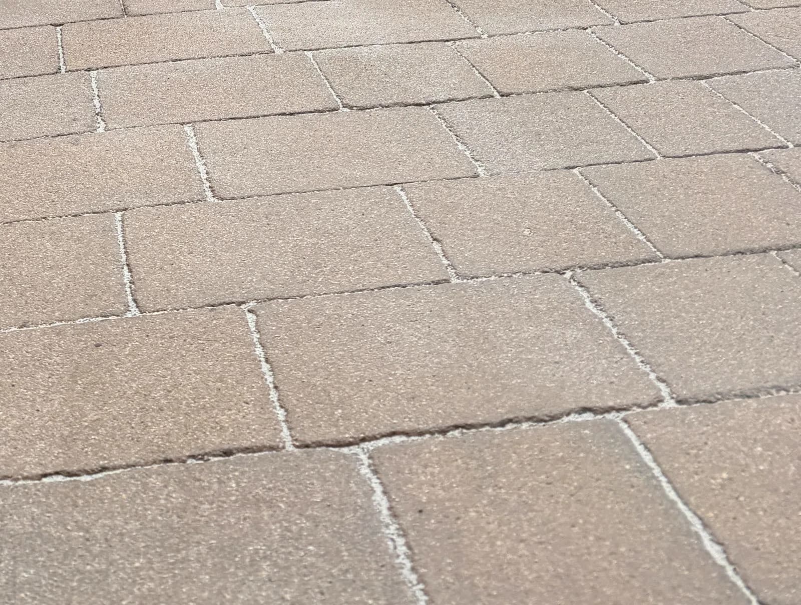 Tight close-up of the restored block paving in High Wycombe, clean blocks with fresh polymeric sand joints