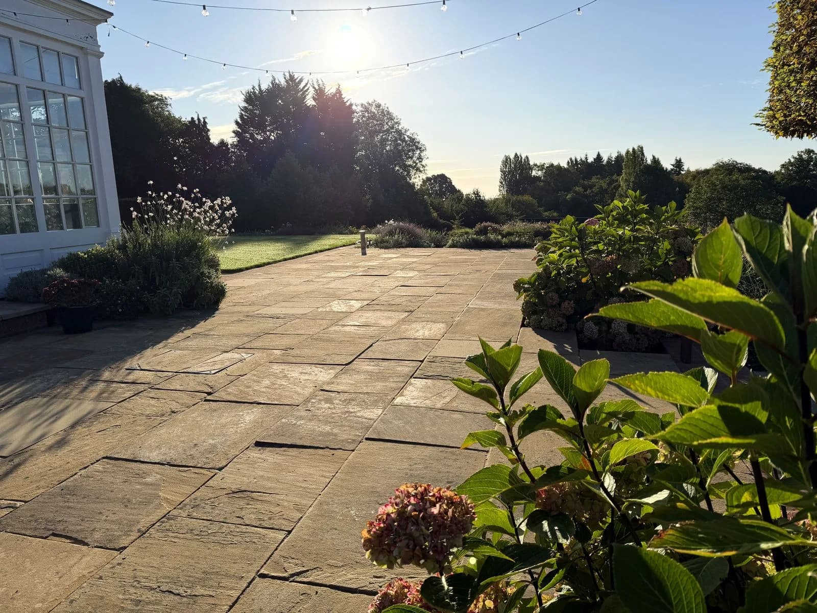 The finished Indian sandstone terrace in Henley-on-Thames, cleaned, relaid and repointed