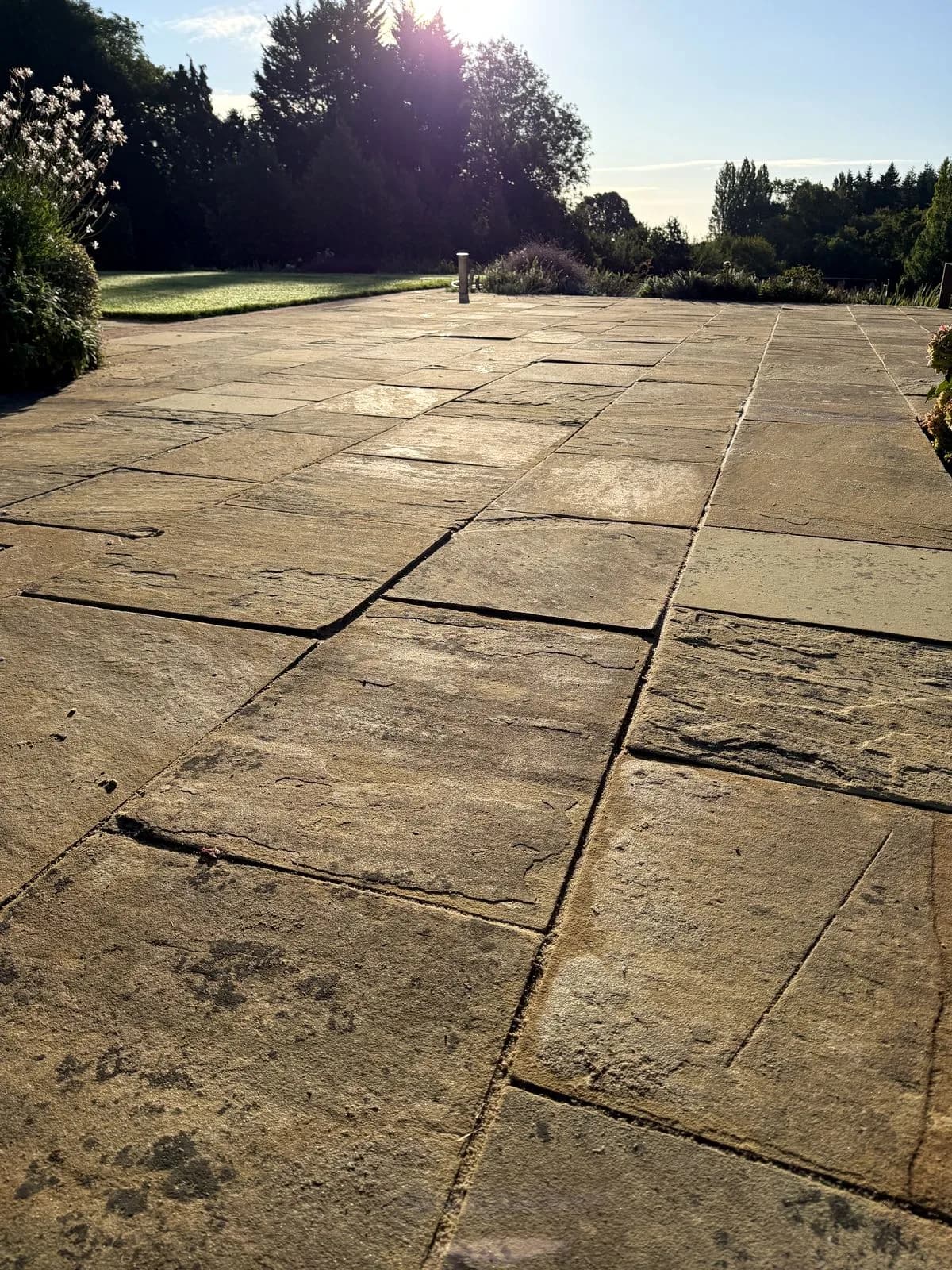 The relaid Indian sandstone slabs and new joints in Henley-on-Thames, with the colour of the stone recovered