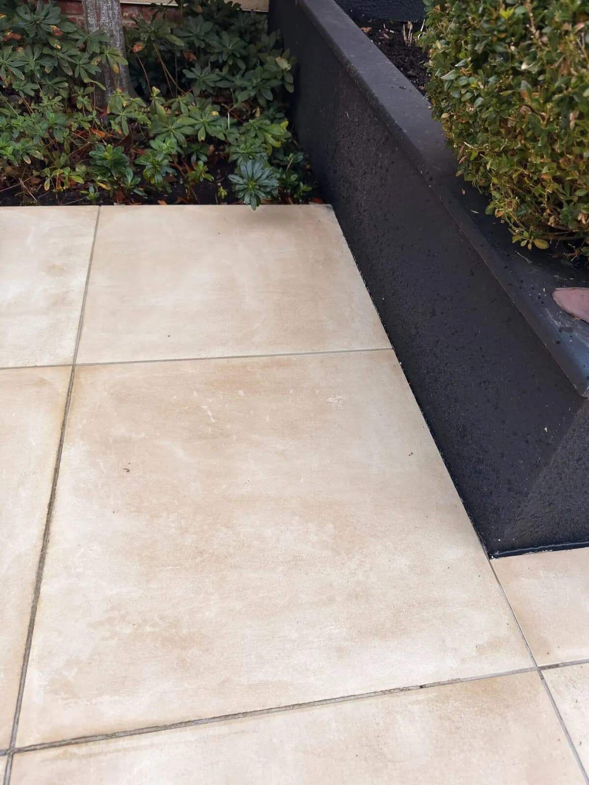 The same porcelain slabs after soft washing