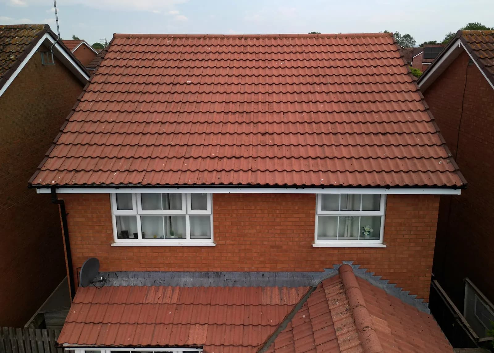 The same rear roof after moss removal and Chiltern EverGuard™ treatment, seen from the same position