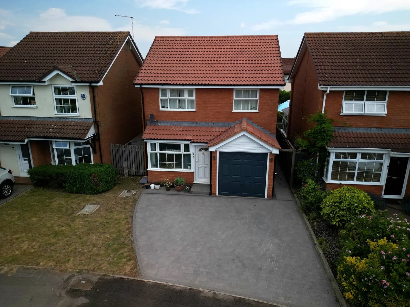 The finished Aylesbury home from the air: the cleaned roof and the cleaned block paved driveway
