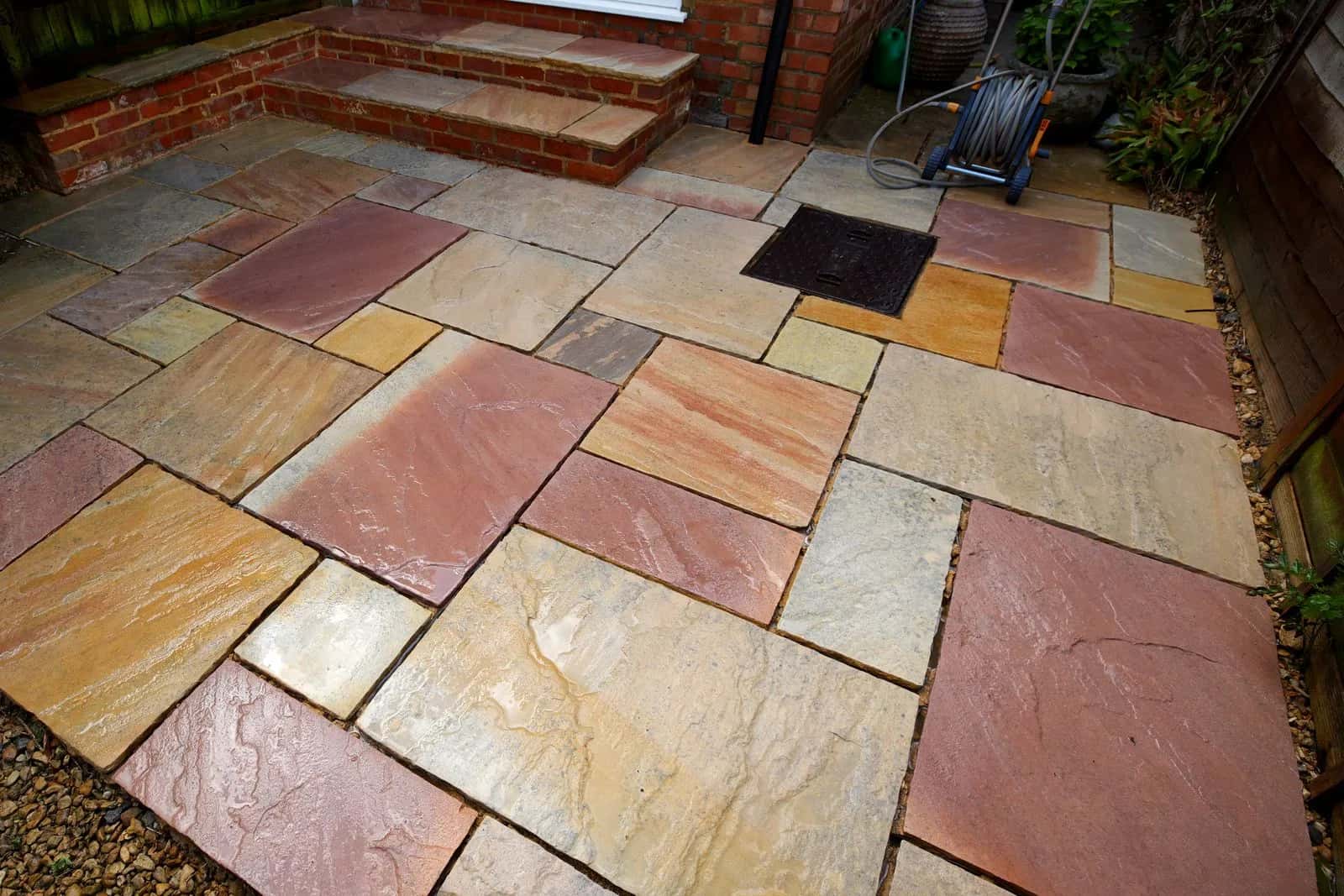 The same view on completion, the sandstone patio cleaned and completely repointed