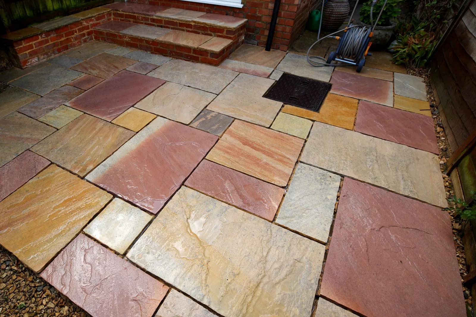 The same view on completion, the sandstone patio cleaned and completely repointed