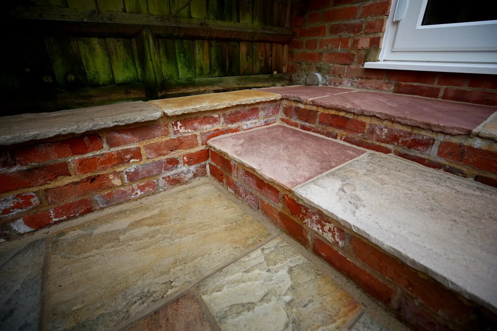 The same brick steps and sandstone after cleaning and repointing in Oxford