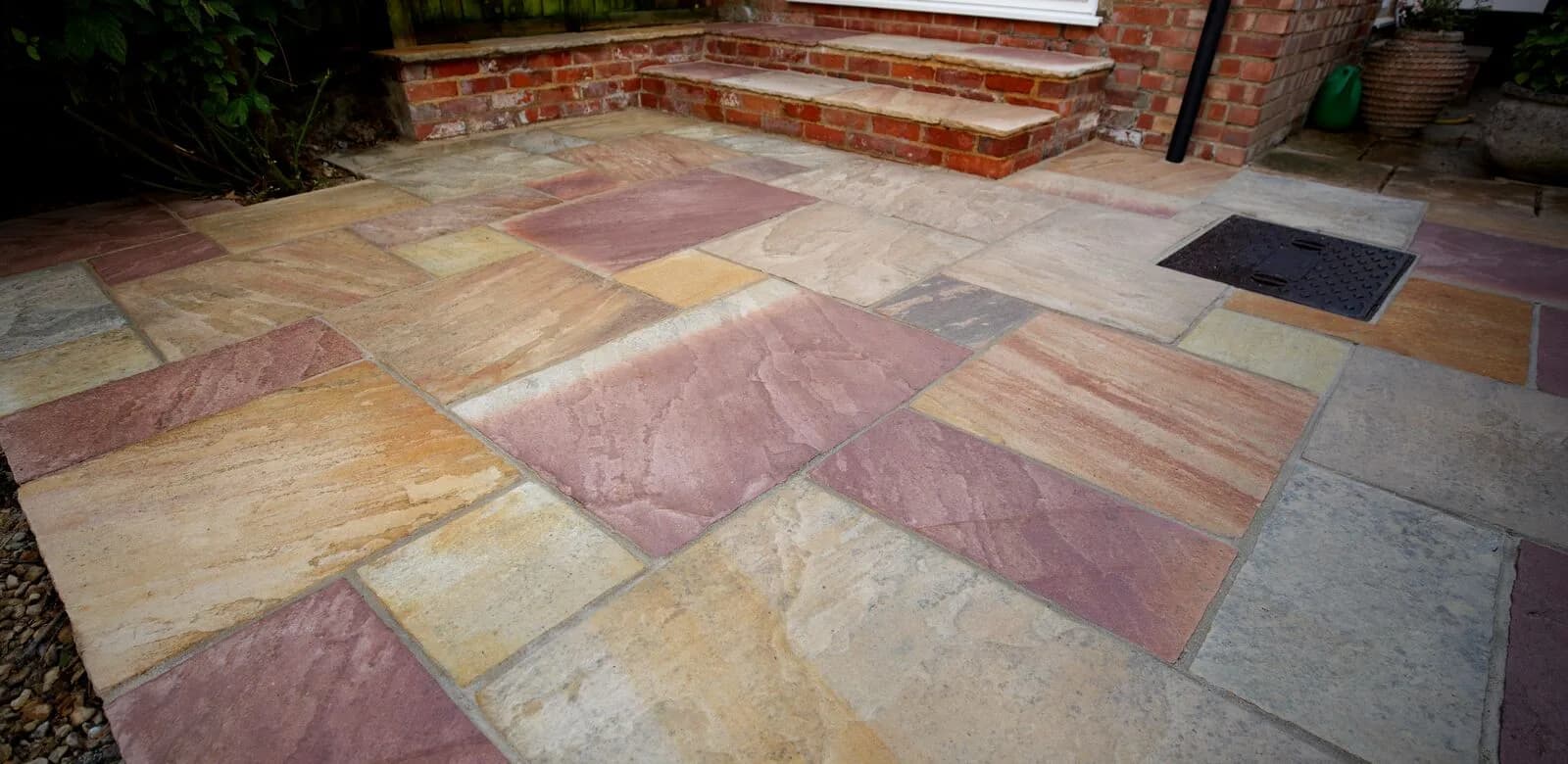 The same sandstone slabs after cleaning and repointing in Oxford