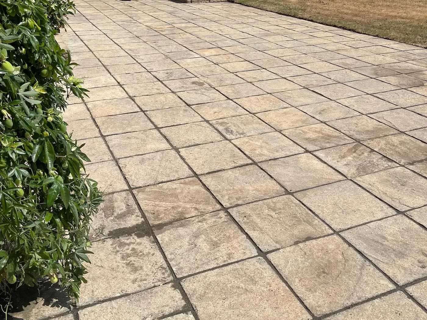 Natural stone patio after cleaning and the Chiltern EverGuard™ Treatment, the stone's colour restored
